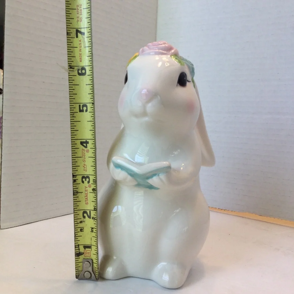 Ceramic Bunny Figurine holding book with Floral Accents
